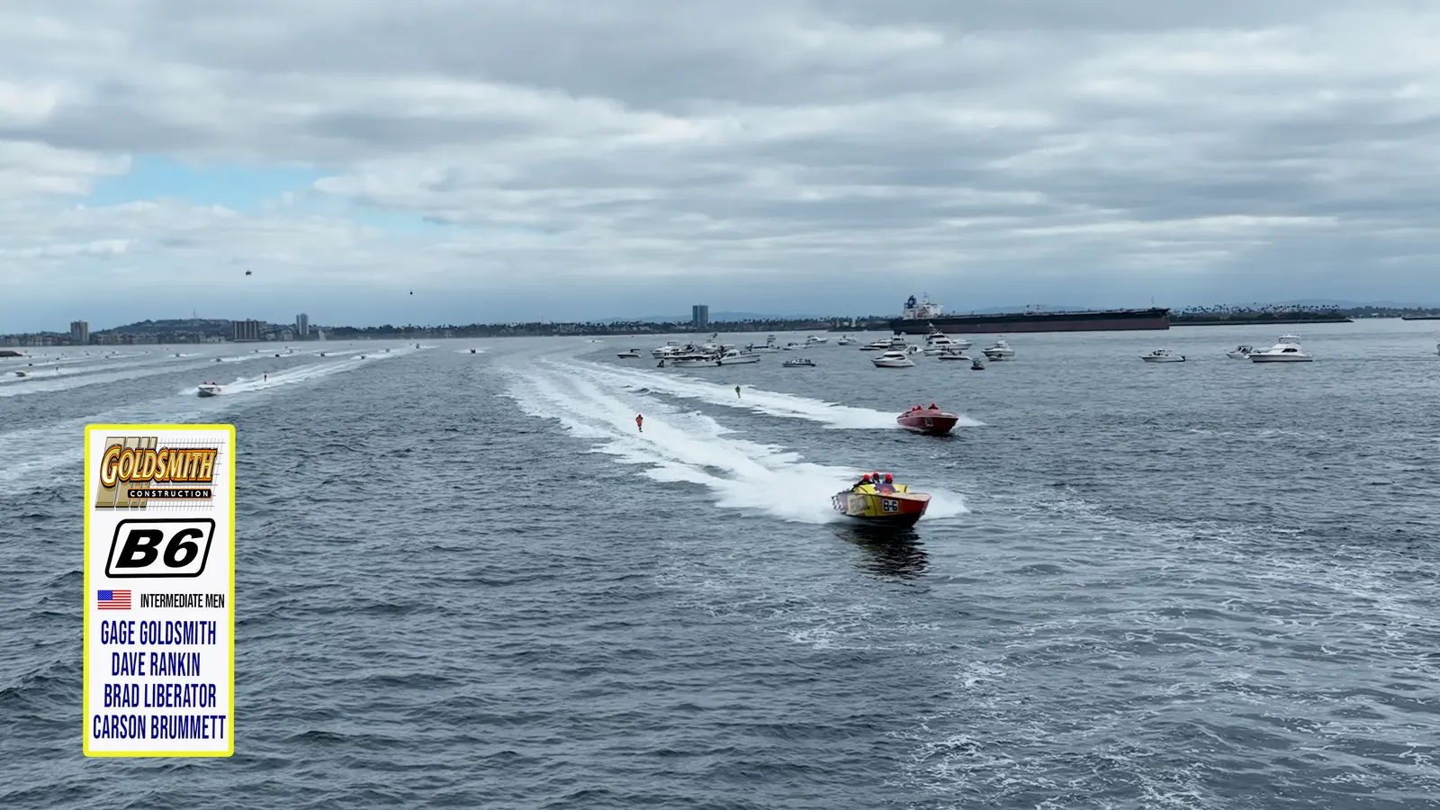 Two race boats running in parallel across open water