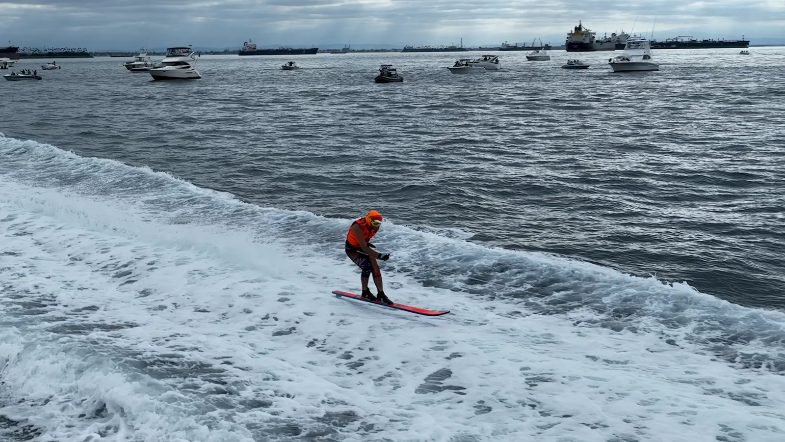 Skier carving through a broad wake during the Catalina race