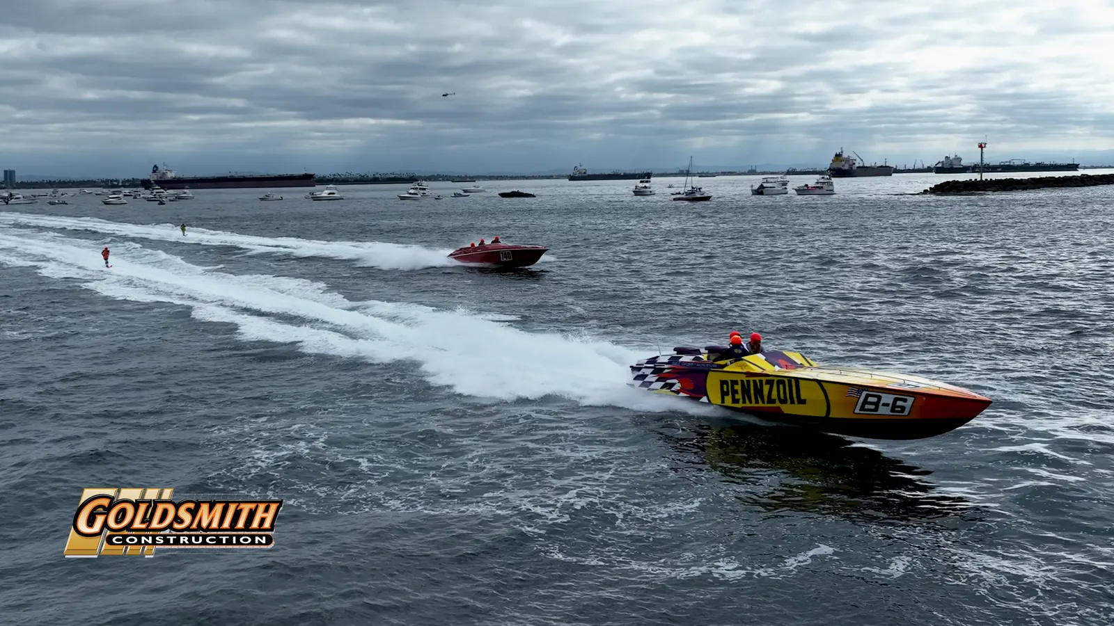 Goldsmith race boat B6 accelerating across the water